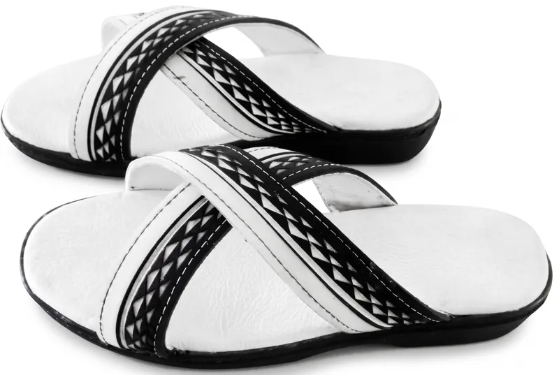 Side view of the pair showing the black rubber sole